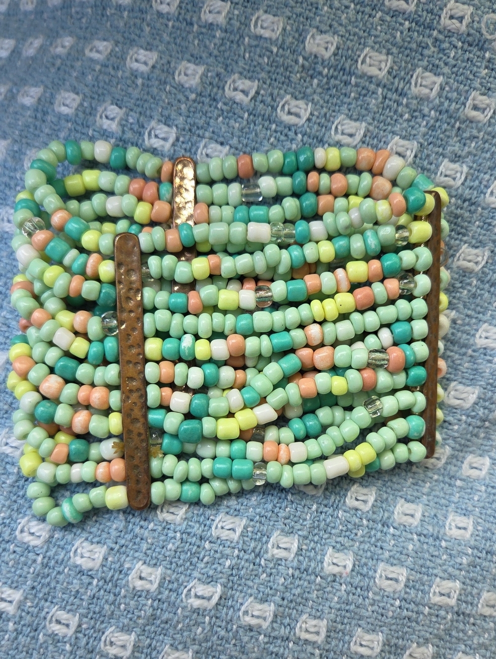Multi-Strand Stretch Pastel Colored Seed Bead Bracelet.